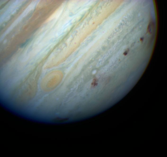 Jupiter_showing_SL9_impact_sites